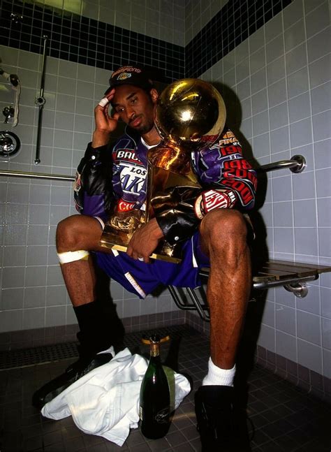 As the NBA celebrates its 75 th. . Kobe holding trophy poster